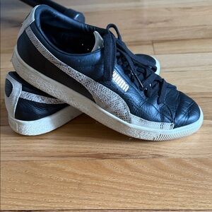 Puma Black Sneakers with White and Gold Details